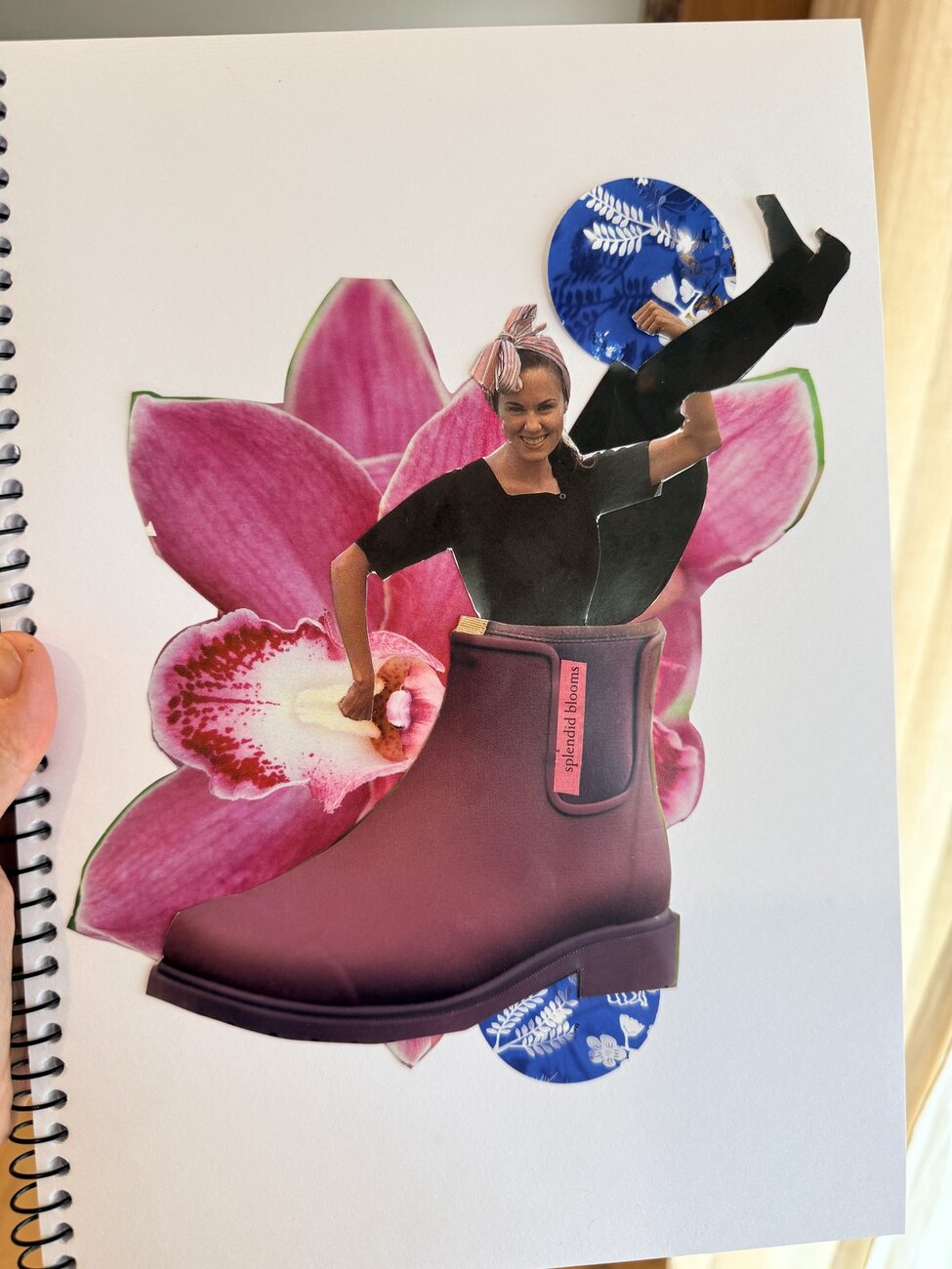 A collage on white: a pink orchid and a small figure leaping out of a sturdy boot