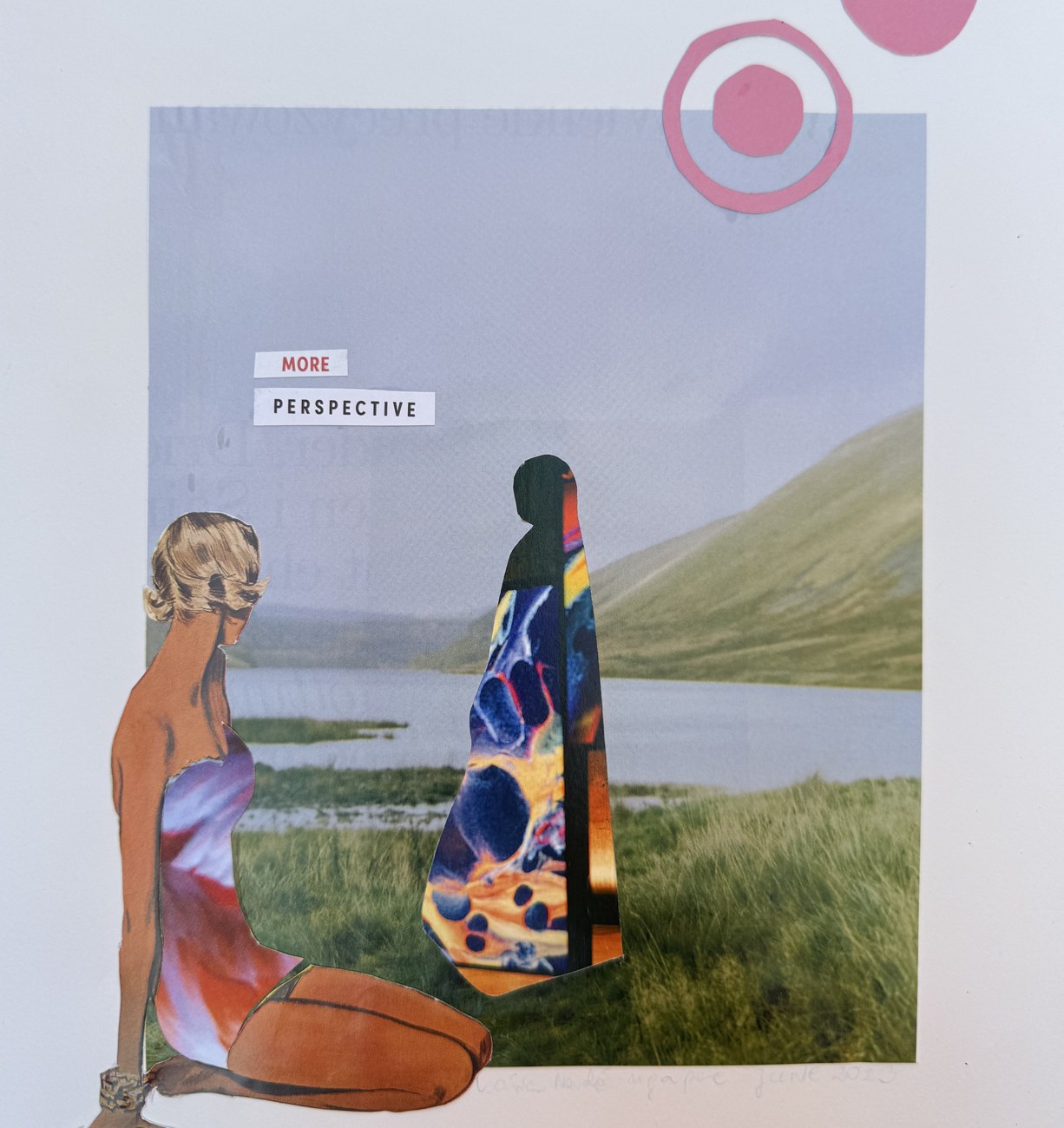 A collage on a white pad: a seated woman looks across a lake at a tall figure patterned in marbled colour, hills behind, with two pink dots and the cut words MORE PERSPECTIVE